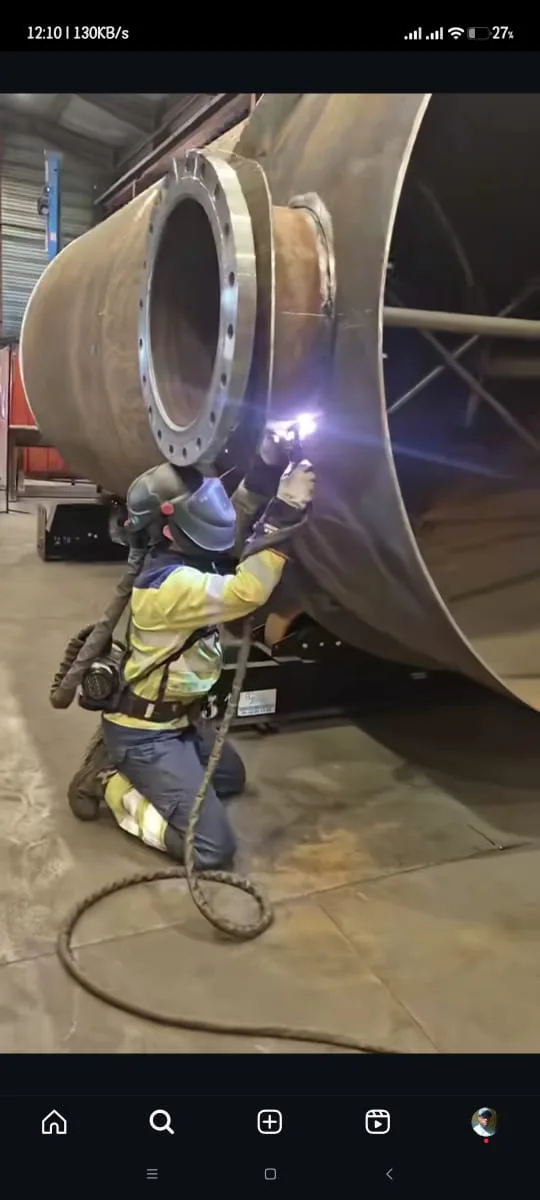 Boilermaker working on steel plates during training